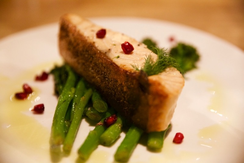 Salmon with broccoli and pomegranate at Obicà Restaurant, St Paul's, London