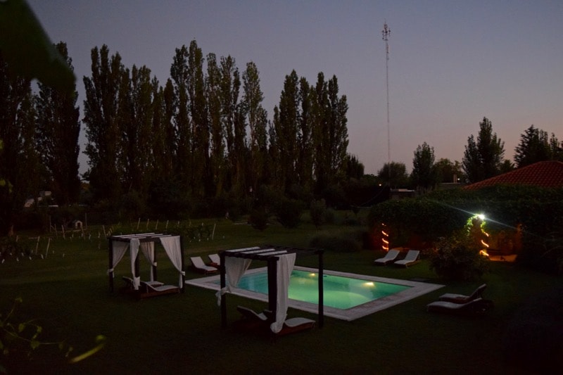 Swimming pool at night at Villa Mansa Hotel