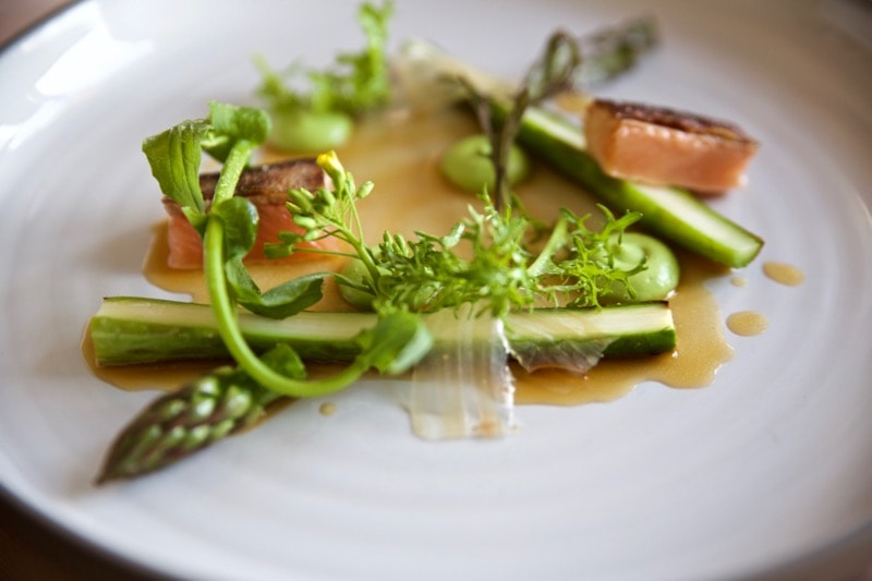 Pan-fried arctic char with asparagus, broccoli puree and browned butter sauce at Olo Restaurant, Helsinki