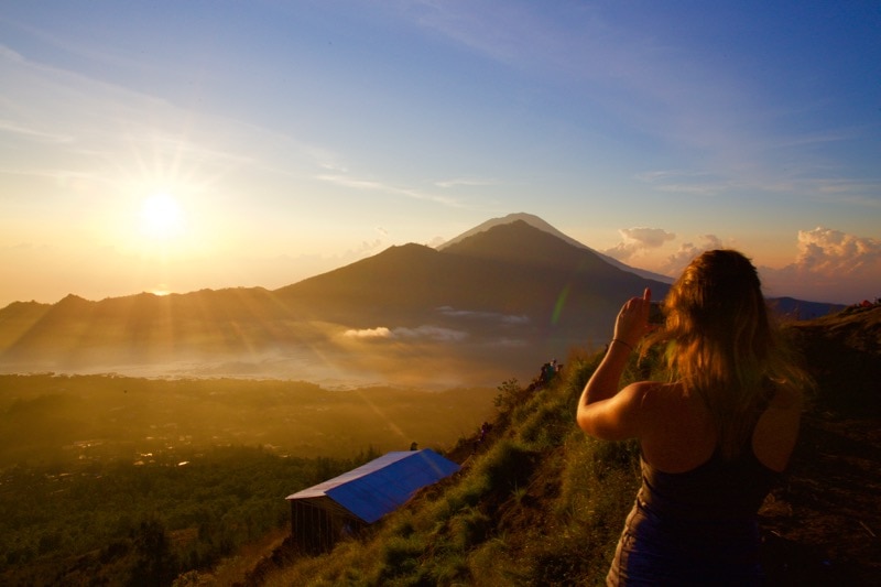 Photographing the incredible view of sunrise from Mount Batur, Bali