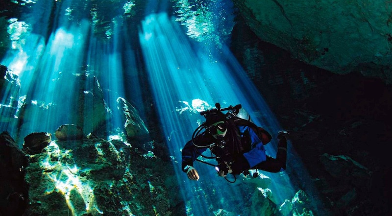 Diving in a cenote, Mexico