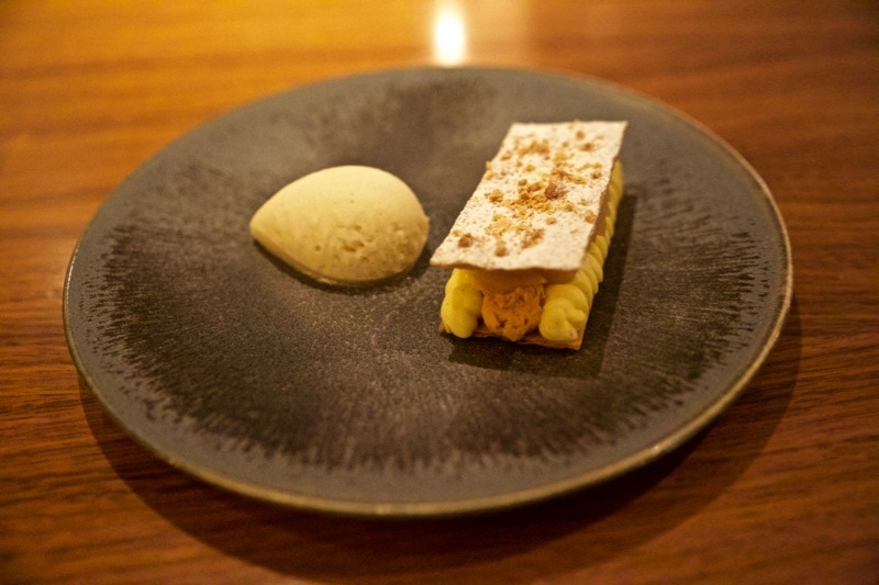 Poached pear galette with crème patissiere, caramelised white chocolate and a poire william sorbet at The Artichoke, Amersham