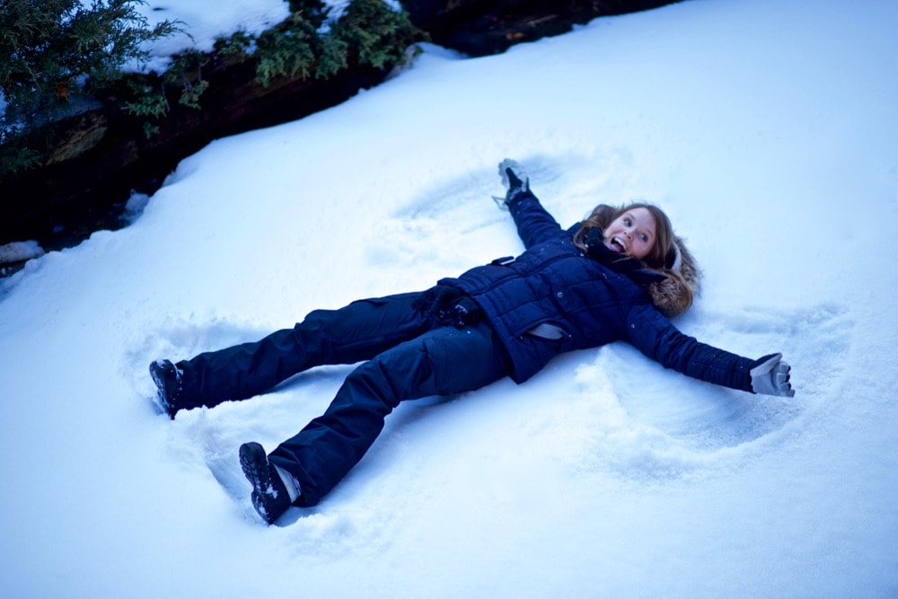 Making snow angels in Zermatt, Switzerland