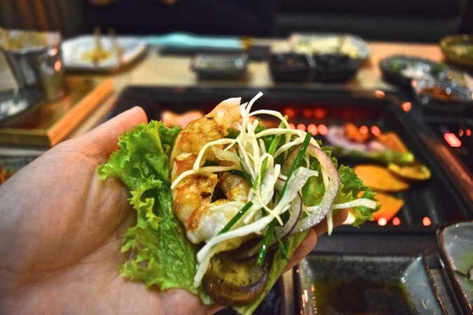 Making wraps at SuperStar BBQ - Korean restaurant in London