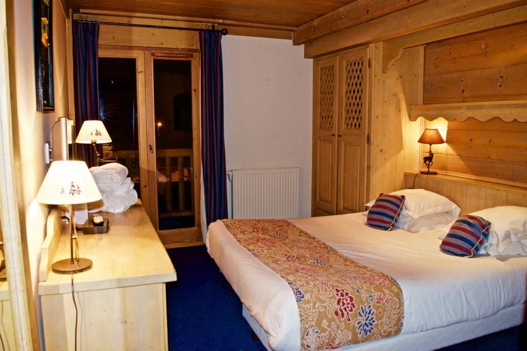 Bedroom at Hotel L'Ecrin Du Val Claret