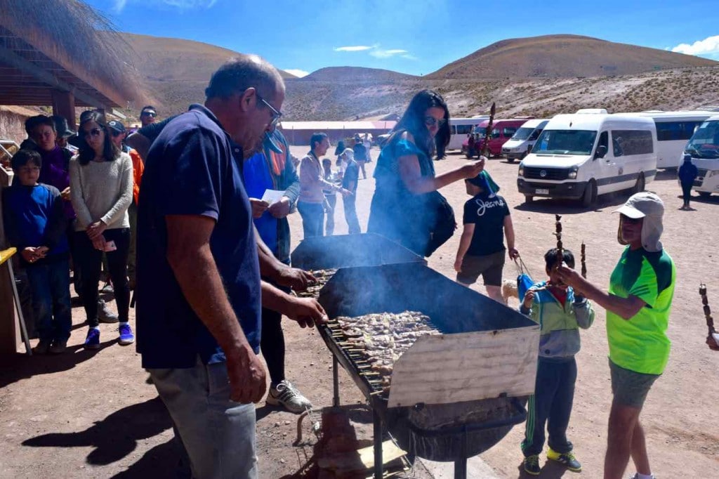 Llama kebabs in Machuca village, Chile