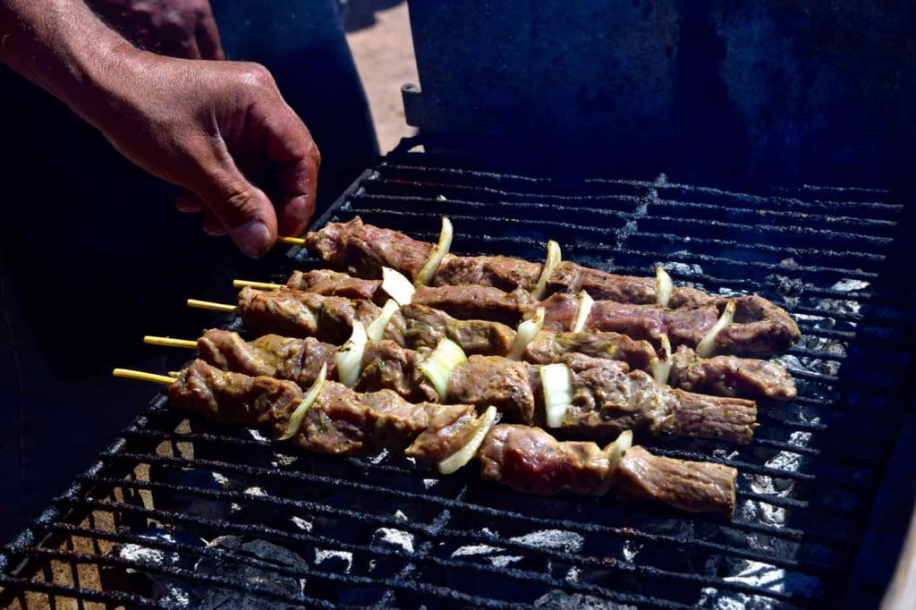 Llama kebabs in Machuca village, Chile