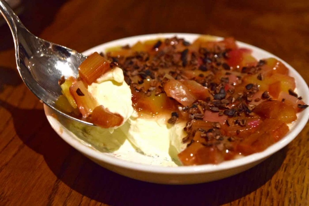 Panna cotta with champagne rhubarb at Olive oil and honey ice at Osteria London