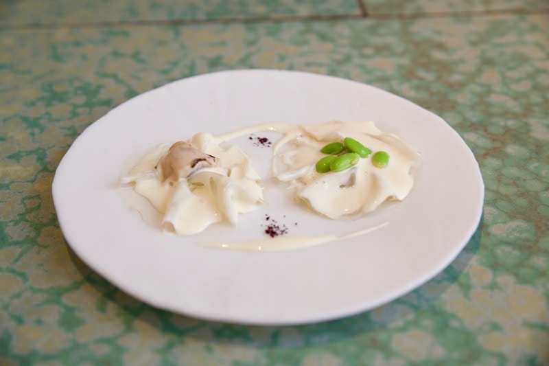 Ravioli with soya beans and oyster (with soy sauce pairing) at Disfrutar Restaurant, Barcelona