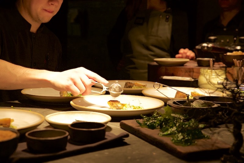 Head chef Rodrigo Perez busy at work at Ekstedt Restaurant, Stockholm 