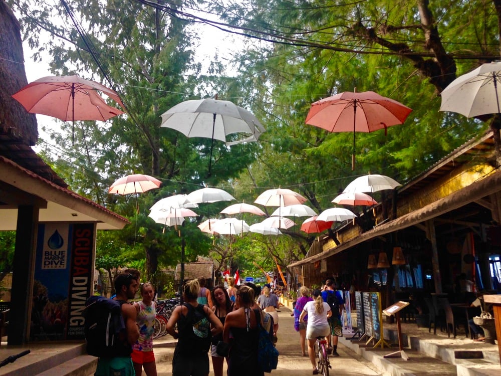 Umbrellas over Main Street in Gili T