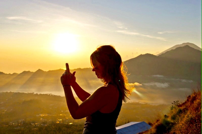 Taking in the incredible view of sunrise from Mount Batur, Bali