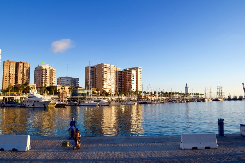 Enjoying the reflections by the water in Malaga