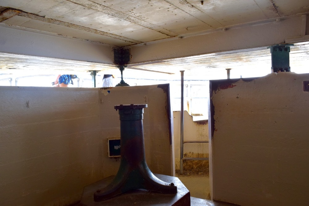 Climbing through the bunker at the top of Diamond Head, Hawaii