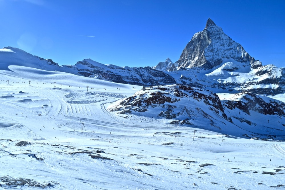 Skiers in front of the Matterhorn, Zermatt, Switzerland