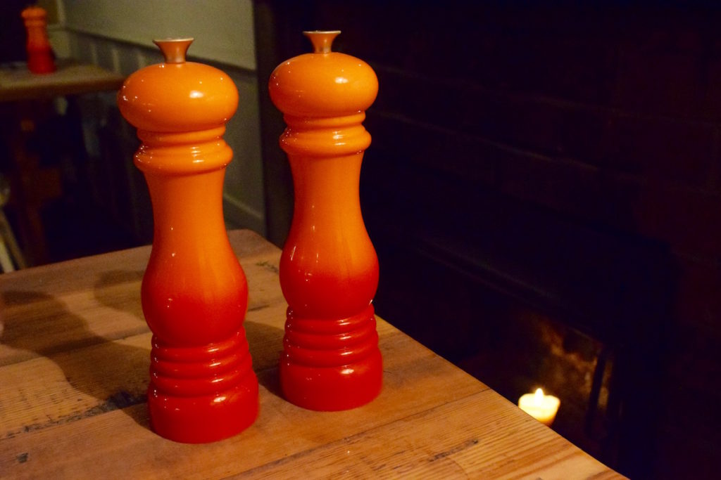 Le Creuset salt and pepper mills at Hawkyns Restaurant, Amersham
