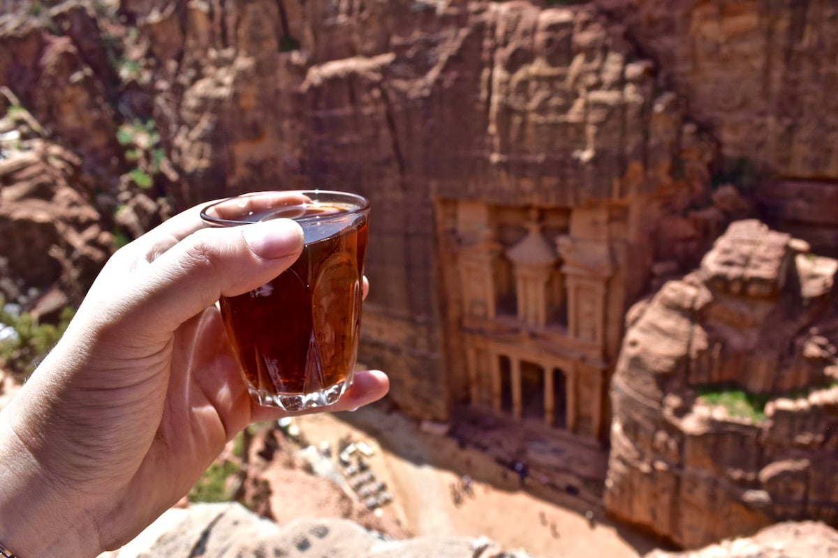 Tea time above The Treasury in Petra, Jordan