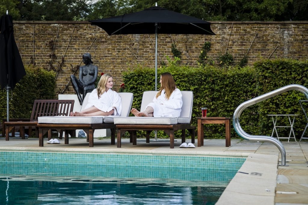 Outdoor pool at Garden terrace at The Grove, Hertfordshire (Paul Winch-Furness / Photographer)