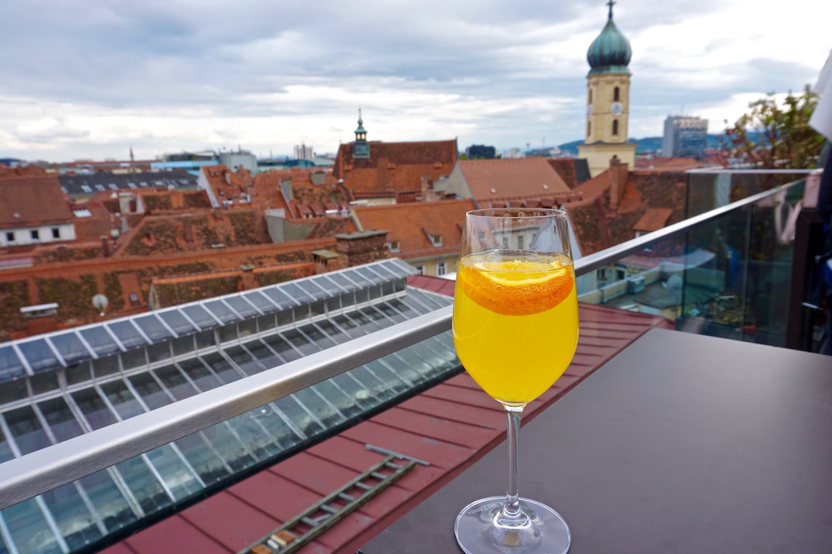 Cocktail time on the rooftop at Kastner and Ohler, Graz