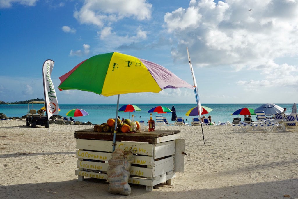 Colourful beach umbreallas in Antigua