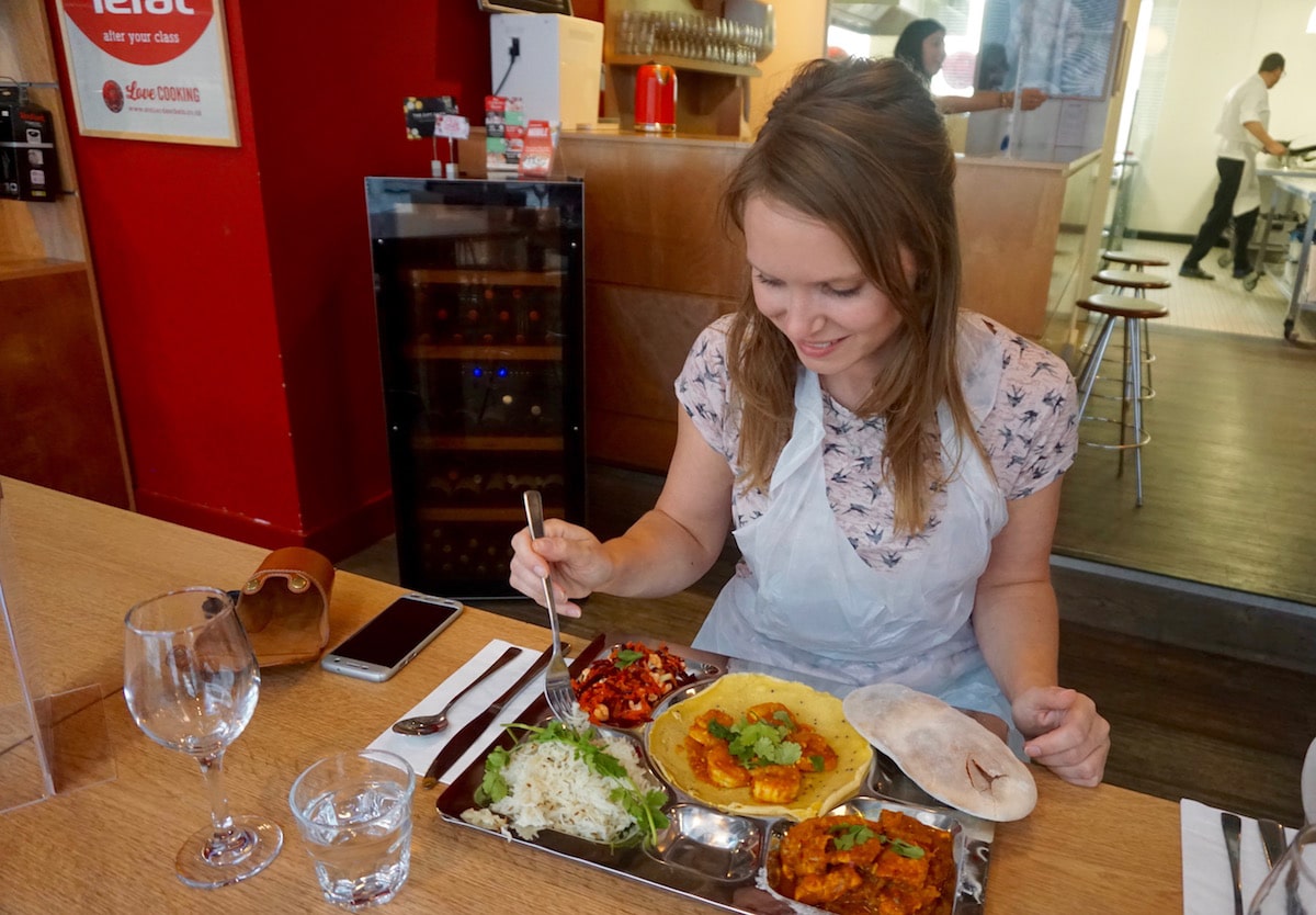 Tucking into the curries I cooked at L'atelier Des Chefs, St Paul's, London
