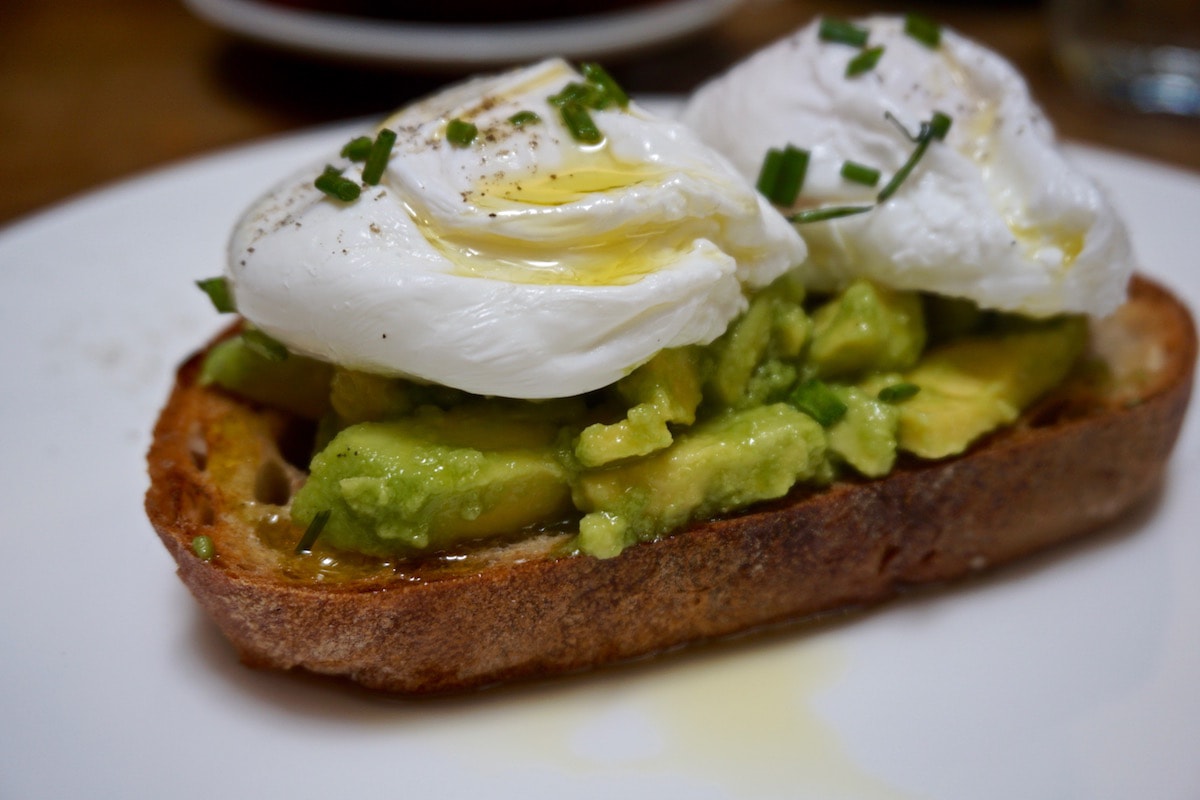 Smashed avocado with poached eggs at The Zetter Hotel, London