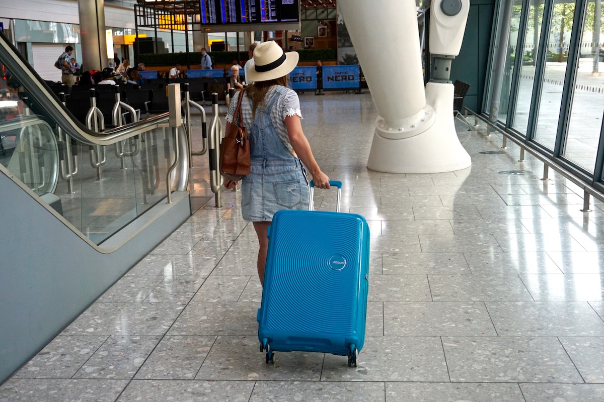 At the airport with my American Tourister Soundbox Suitcase