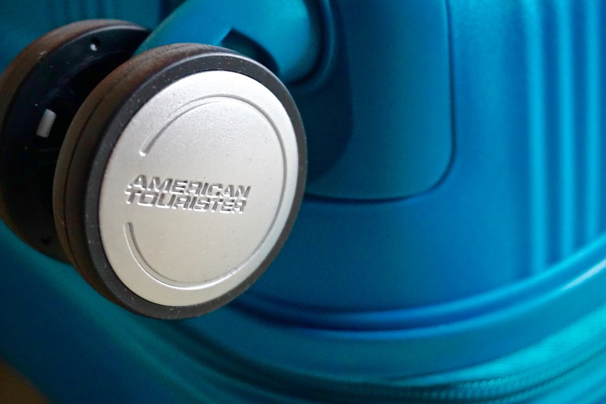 Branded spinner wheels on the American Tourister Soundbox Suitcase