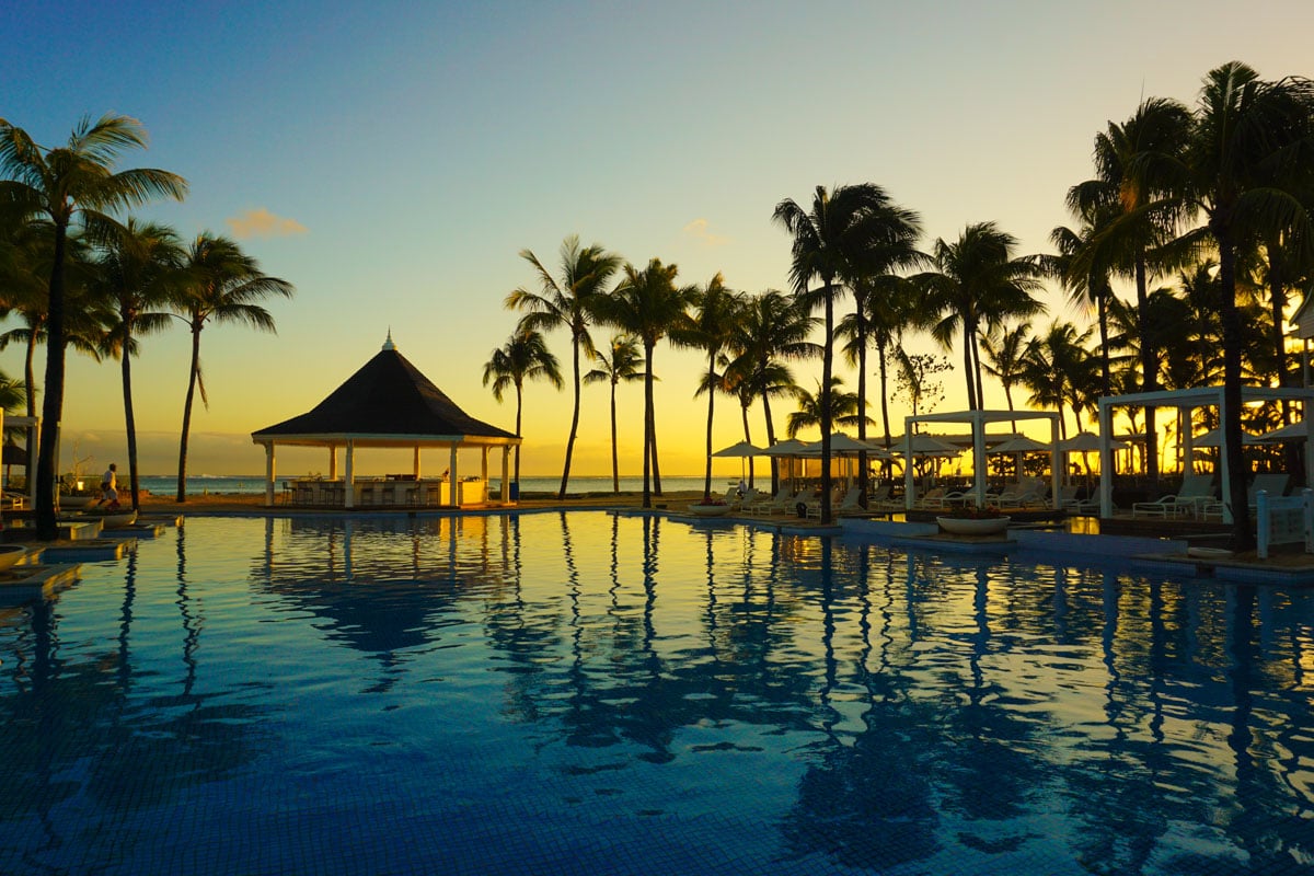 Sunset pool views at Heritage Le Telfair Mauritius