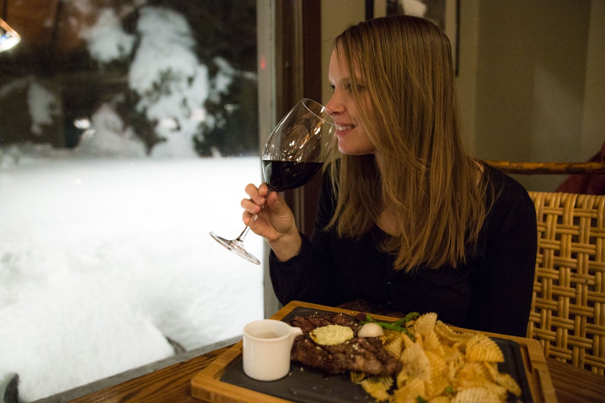 Enjoying dinner overlooking the snow at Deer Lodge, Lake Louise