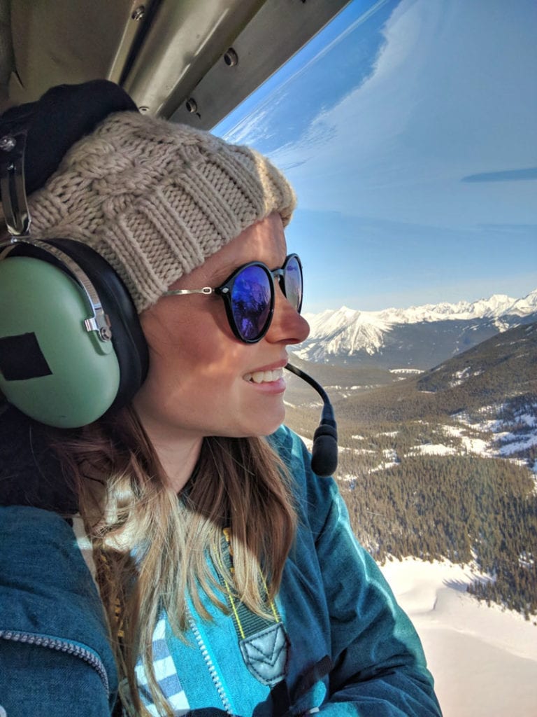 Enjoying the helicopter flight over the Canadian Rocky Mountains, Alberta