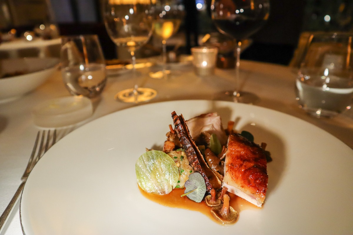 Cotswold white chicken, which came with bacon, artichoke, hazelnut and chanterelle mushrooms at Petrus Restaurant London