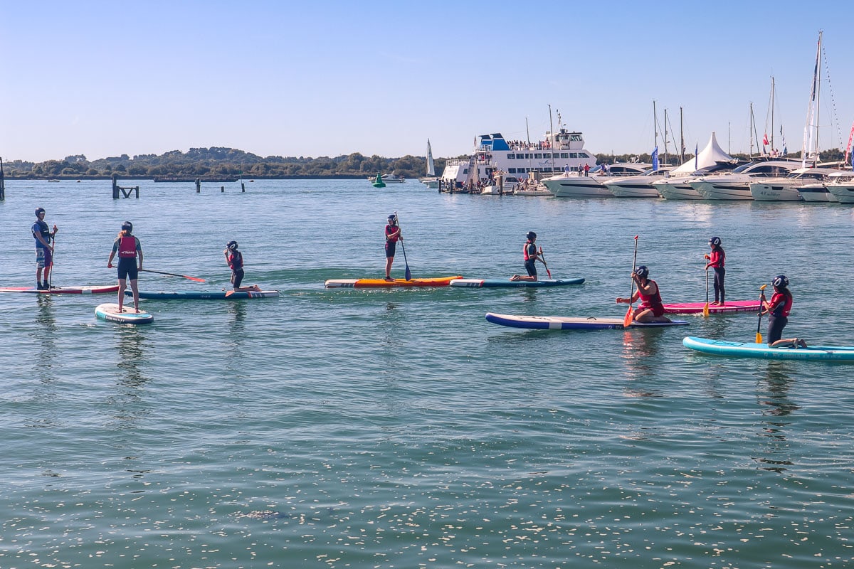 Trying paddle boarding at the Southampton International Boat Show