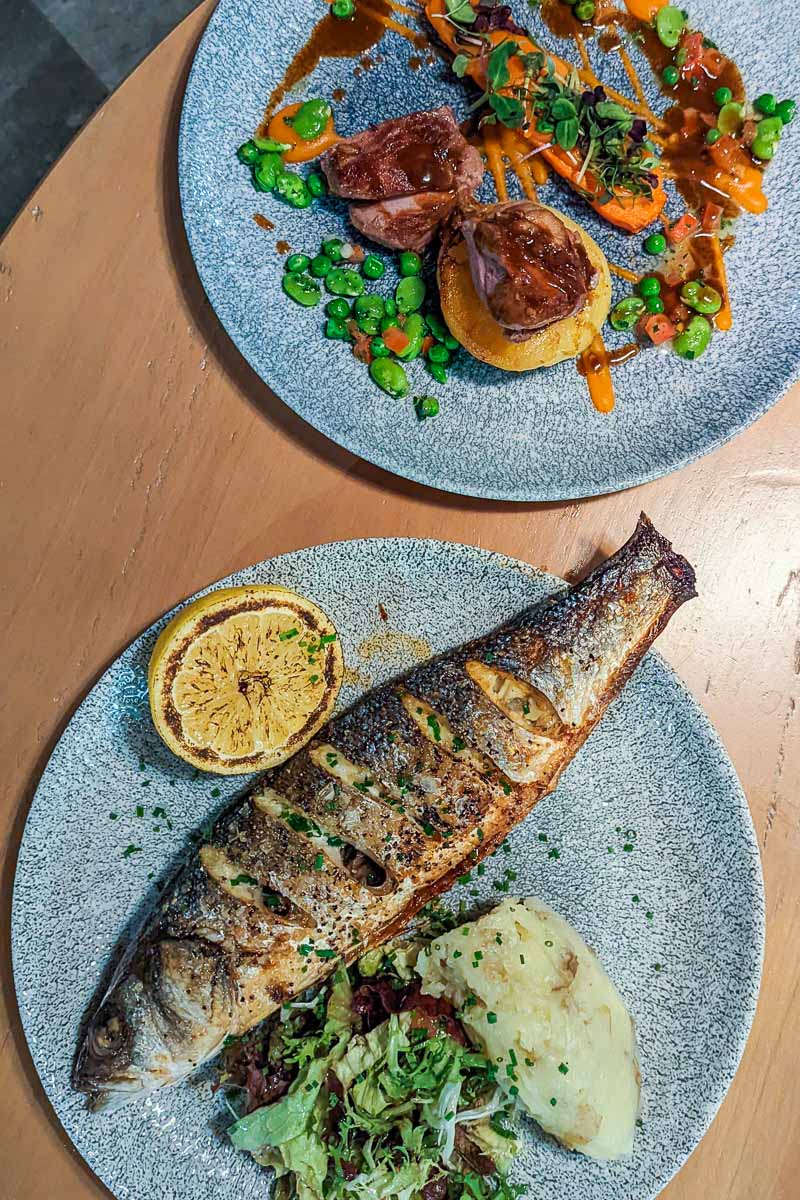 Lamb and sea bass for mains at Milk Wood Kitchen & Bar at Dylan Coastal Resort