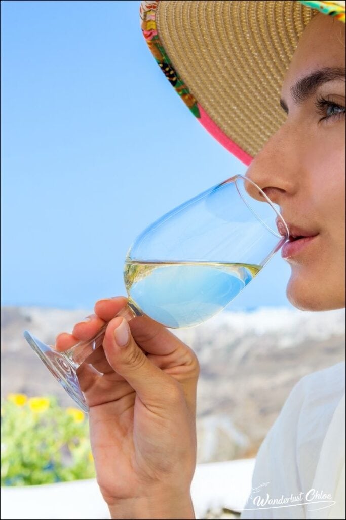 Drinking wine in Santorini