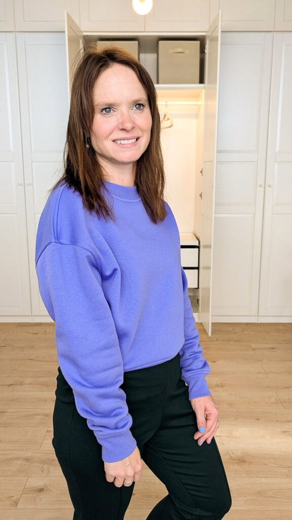 Cute purple sweatshirt with green pintuck trousers
