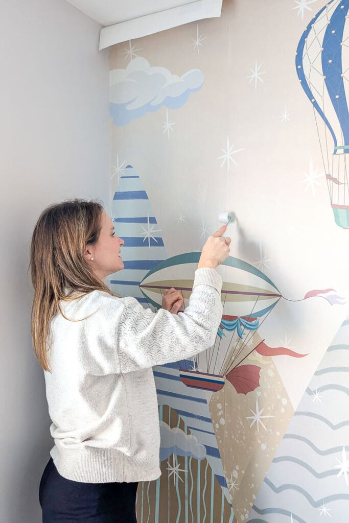 seam rollering the first mural edges