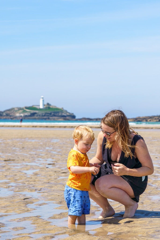 Playing on Gwithian Beach in Cornwall