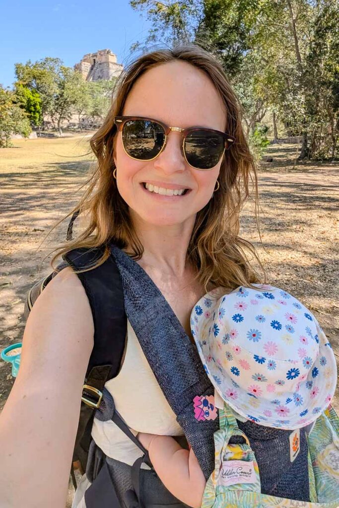 visiting ruins in mexico with baby in carrier